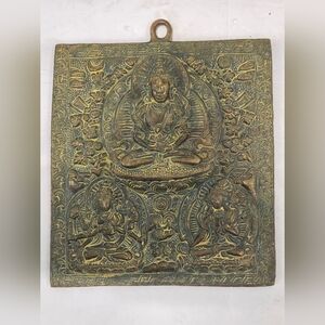 Btass Wall Plaque depicting the Buddhist deity Vasudhara, the goddess of wealth